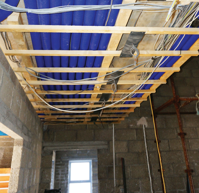 The MVHR ductwork is divided between the ground floor, first floor and vaulted ceiling