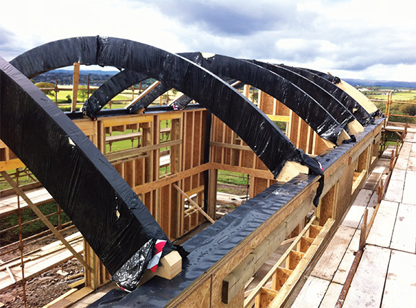 The roof’s curved glulam beams