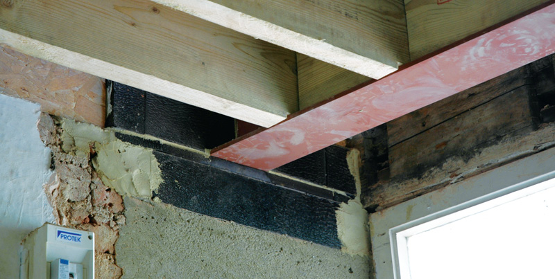 The joists are isolated from external walls in Perinsul blocks, with gaps left for internal insulation