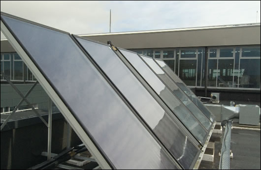 One of the decentralised flat plate solar arrays, which contribute towards domestic hot water supply, with a separate array for each department of the council