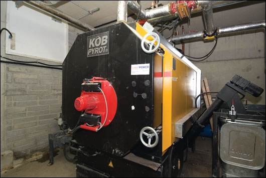 Primary heating comes from a KOB Pyrot 540kW woodchip boiler backed up by a 380kW gas boiler located in an underground boiler room, between the carpark and the eastern edge of the building