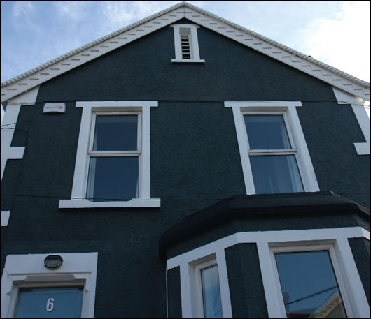 The title picture is a view from the back garden of Michael Bredican’s house in Clontarf, and the façade (above) of Fionna Fox and Bernard McCabe’s Smithfield house, two distinctly different existing homes where distinctly different solutions were taken to improve energy performance and reduce carbon emissions