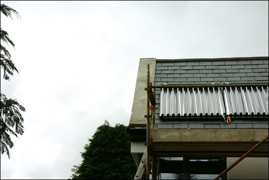 Calpax vacuum tube solar panels being installed