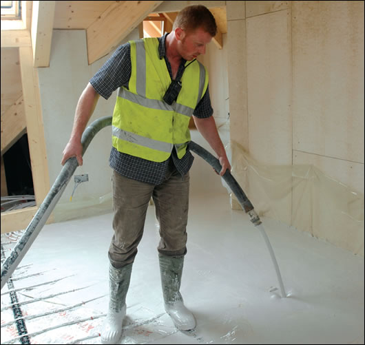 The space heating is distributed by an underfloor heating system, with the piping laid as shown here in the master bedroom