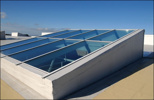 Four large glass roof-lights allow natural light to enter the store and triple glazing is used throughout