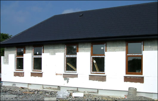 a house being externally insulated by limerick-based external insulation specialists Greenspan
