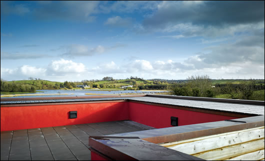 A public viewing platform sits on top of the building