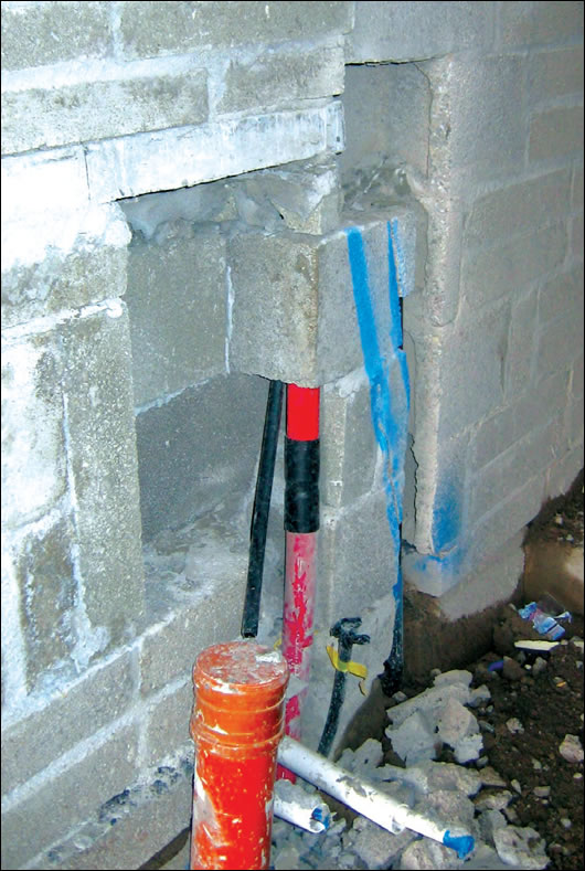 Utility box recesses in a hollow block wall