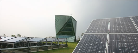 A large solar PV array supplements space and water heating, and meets most of the building’s electricity requirements