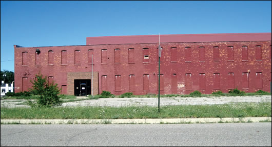 a boarded-up building in Flint, Michegan