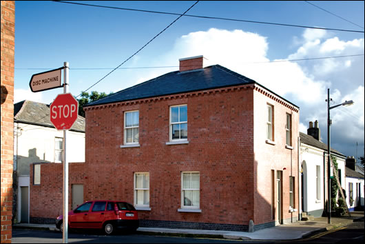 The new timber-frame building boasts impressive thermal performance despite thin walls being required on the tight plot. The brick finish is one of the building’s crowning achievements, fitting comfortably in the surroundings of Dublin's north inner city