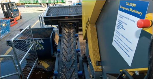 all waste wood is fed in to a wood chipper located at the rear of the building, enabling fuel for the woodchip boiler to be generated onsite