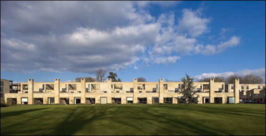 The development is set amidst large open areas and mature trees; UK-sourced Oak was used for balconies