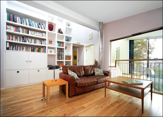 there is extensive glazing at the rear, providing a bright and open main living area