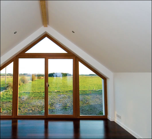 extensive glazing on the southern side allows for maximum passive solar gains