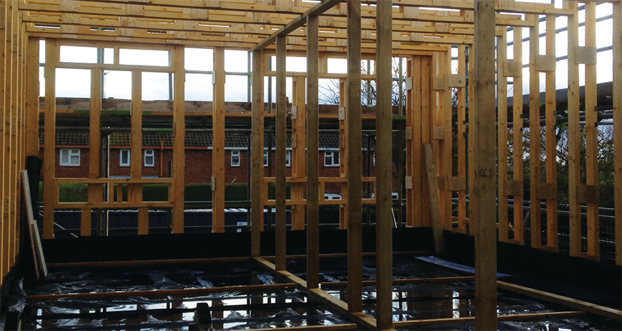 The patented Beattie Passive timber frame system being erected on site. The system’s 220m deep timber studs are insulated with Ecobead, with Kingspan Kooltherm phenolic board also installed externally