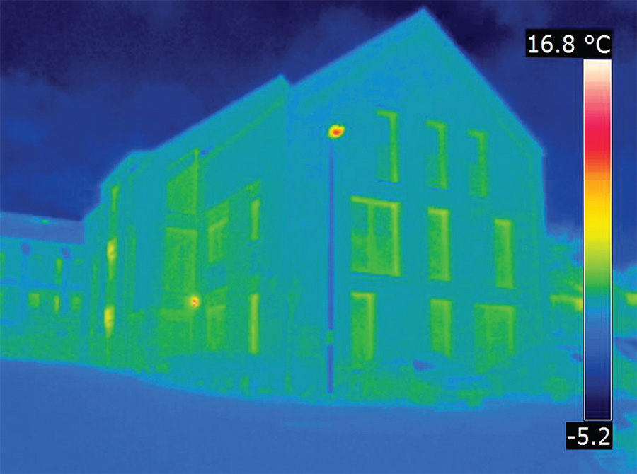 A thermal imaging survey highlights the low level of heat loss from the dwellings