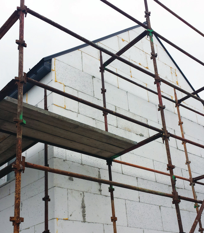 The walls of the main house are externally insulated with 250mm StoTherm EPS with adhesive fixing