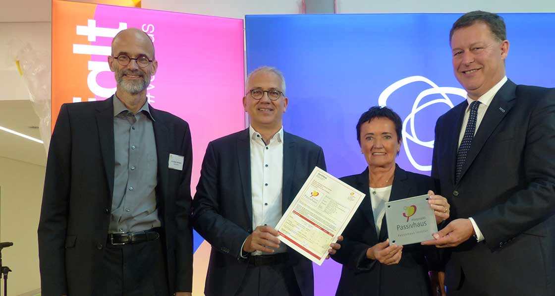 (above, l-r) Passive House Institute joint MD Dr Jürgen Schnieders, Hesse minister of economic affairs Tarek Al-Wazir and city councillor Rosemarie Heilig present the passive house certificate to management board chairman Martin Menger.