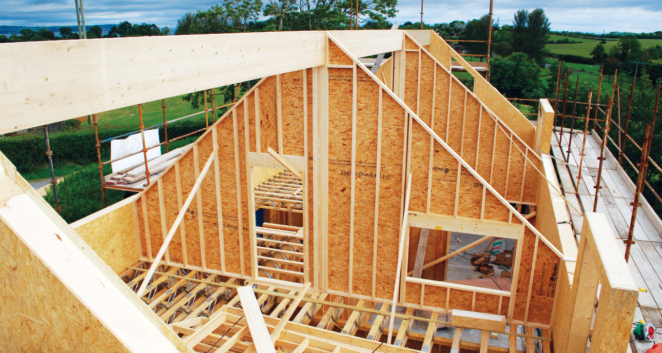 Erection of the structural insulated panel system, which facilitates eliminating cold bridges, because the system creates a continuous thermal envelope through walls and roof