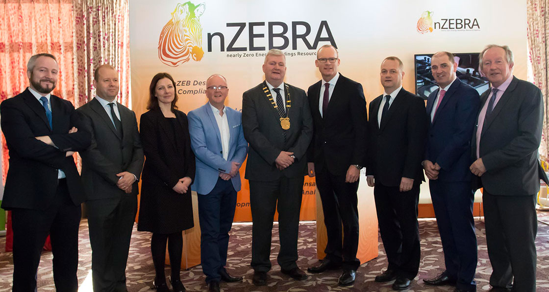 Pictured at the nZEBRA conference are (l-r) SEAI CEO Jim Gannon; Department of Housing advisor Seán Armstrong; Wexford County Council’s Enniscorthy district manager Liz Hore; nZEBRA director Tomás O’Leary; Wexford County Council chairman Paddy Kavanagh; housing minister Simon Coveney; Wexford County Council chief executive Tom Enright; minister of state Paul Kehoe; and Construction Industry Federation director general Tom Parlon.
