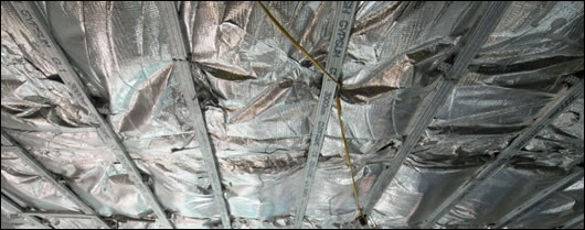 EcoQuilt Multi Foil insulation, with an advertised U-value of 0.2, separates each floor from the one below it. 