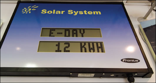 The solar panels' electricity production statistics are proudly displayed in the factory shop on-site for all to see