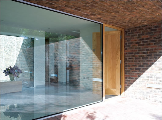 The buildings make no sacrifices in design as this striking glazed entry corridor shows