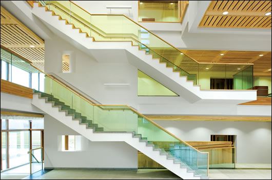 the three storey central atrium is an integral part of the building’s natural ventilation strategy