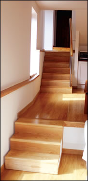 The split level led to the development of a moveable stair that allows flexibility in use of the space