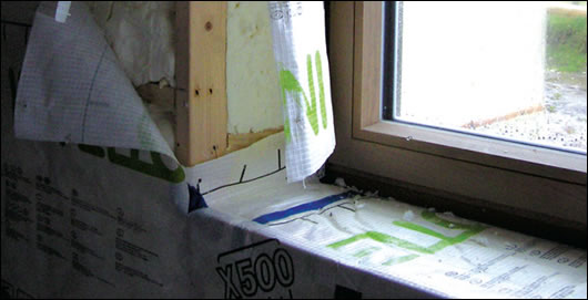 Biobased soy foam insulation still visible prior to air-tighness sealing