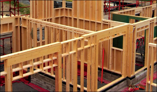 The timber frame system being erected