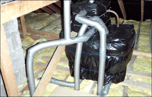 With the insulation reducing heat loss into attics, water tanks and pipes were insulated and neatly sealed to prevent freezing