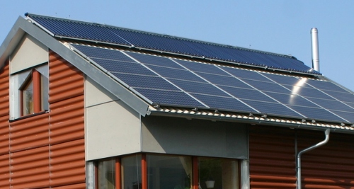 A solar photovoltaic array-clad passive house, a site that may become more familiar due to the Passive House Institute&#039;s new certification system 