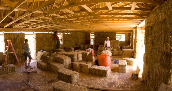 Straw bale building under construction