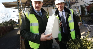 Former energy minister Ed Davey visiting a council house that received external insulation & heating system upgrade under the Energy Company Obligation (Eco) scheme in March 2015